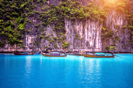 long-boat-blue-water-maya-bay-phi-phi-island-krabi-thailand (1) 1